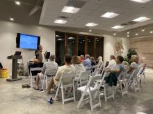 Chris Hasegawa, speaking to the 30A audience about 