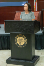 Robyn Evans at podium-4216.png