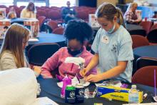 Group table activity, each group receives a plastic bag with the same items to build a raft. Groups are challenged to be able to place at least 50 pennies on the float before it sinks. Participants are encouraged to test their designs, regroup, retest, all a process of engineering.
