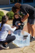 Group table activity, each group receives a plastic bag with the same items to build a raft. Groups are challenged to be able to place at least 50 pennies on the float before it sinks. Participants are encouraged to test their designs, regroup, retest, all a process of engineering.